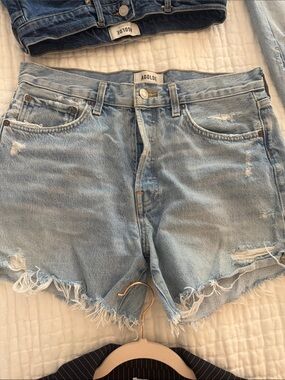 Agolde Light Wash Distressed Denim Cutoff Shorts